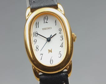 Near MINT] SEIKO Noie 1F21-5B70 21mm Gold White Dial Oval Quartz Women's Watch