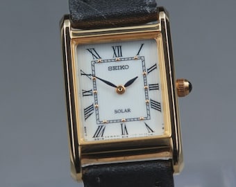 Near MINT] SEIKO V115-0BD0 Solar Gold Roman Dial Tank 18mm Quartz Women’s Watch
