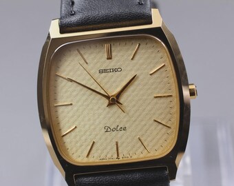 Near MINT] Vintage SEIKO Dolce 7741-5100 30mm Gold Dial Quartz Men's Watch