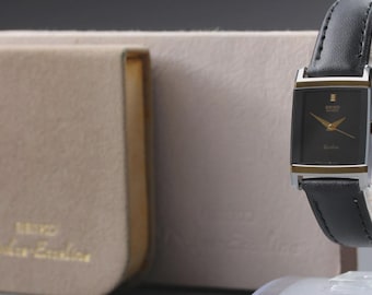 Near MINT+ W/Box] SEIKO Exeline 7321-5740 Black Dial Tungsten Qz Woman's Watch