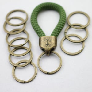 5 anelli divisi in metallo placcato bronzo: accessori per portachiavi da 33 mm - zm568ab