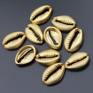 10 breloques cauris en or mat : perles double face en ZAMAK - zm573mg