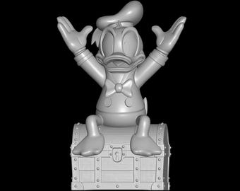 May include: A gray 3D-printed figurine of Donald Duck sitting on a treasure chest with his arms raised. The figure has a bow tie, hat, and is detailed with rivets and a keyhole on the chest.