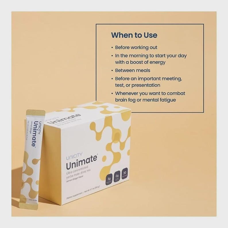 May include: A box and a single packet of Unimate drink mix. The box is white with a yellow abstract design and the Unicity logo. The packet is white and gold. Text on the box and packet reads "Unimate Ultra-concentrated yerba mate drink mix Lemon Ginger Flavor."