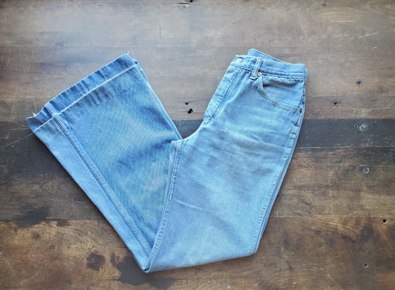 Vintage Brutus size 27 medium wash 90s bell bottom
