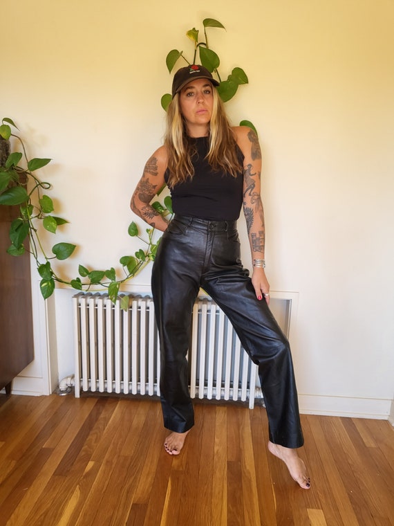 Vintage size 31 black leather pants / black leathe