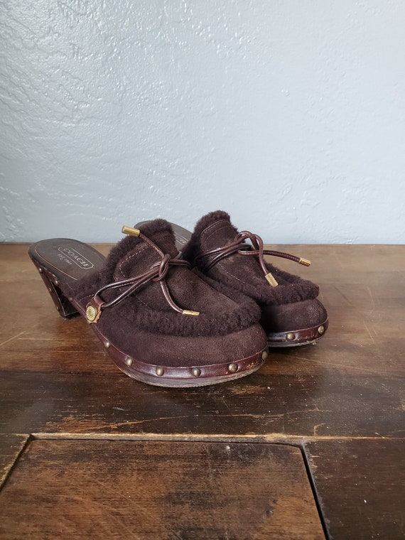Vintage brown tassel Coach clogs / wood fur vintag