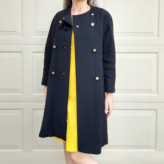 Manteau noir online sans col