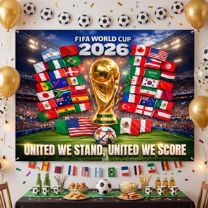 May include: A rectangular banner featuring the FIFA World Cup 2026 logo, a golden trophy, and numerous national flags arranged around a stadium background. The text reads FIFA WORLD CUP 2026 and UNITED WE STAND, UNITED WE SCORE in white letters.
