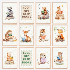 May include: A set of twelve framed art prints featuring watercolor illustrations of woodland animals reading books. The animals include a raccoon, bear, squirrel, hedgehog, deer, chipmunk, fox, owl, and mouse. The text "COOL KIDS READ BOOKS" is displayed on two of the prints.