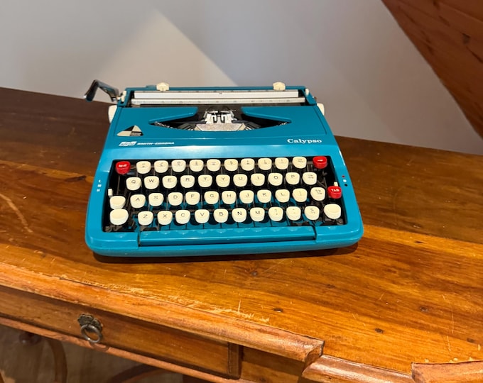 Featured listing image: Vintage Smith Corona Calypso Typewriter | Teal Blue 1970s Portable QWERTY (With Case)