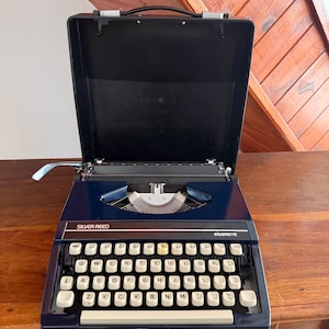 Vintage Silver-Reed Silverette Typewriter – Navy Blue, Working Condition with Case