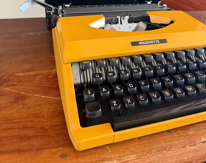 Featured listing image: Vibrant Mustard Yellow Silverette Portable Typewriter – Fully Functional - No Case