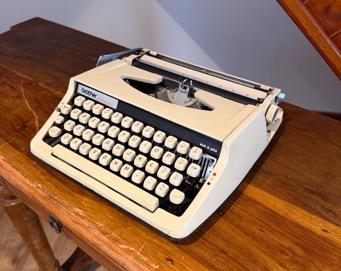 Featured listing image: Vintage Brother Deluxe 800 Typewriter – Cream Portable, Japanese Precision Case
