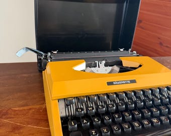 Vibrant Mustard Yellow Silverette Portable Typewriter – Fully Functional and Case & Ribbon