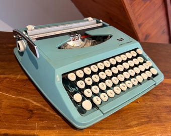Máquina de escribir Smith-Corona Corsair vintage - Azul huevo de petirrojo - Funciona con manual y estuche - Portátil SCM de mediados de siglo - Regalo retro para escritores