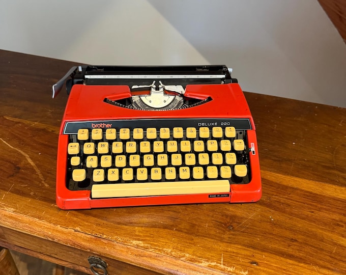 Featured listing image: Vintage Brother Deluxe 220 Typewriter | Red 1970s Portable Manual QWERTY (With Case)