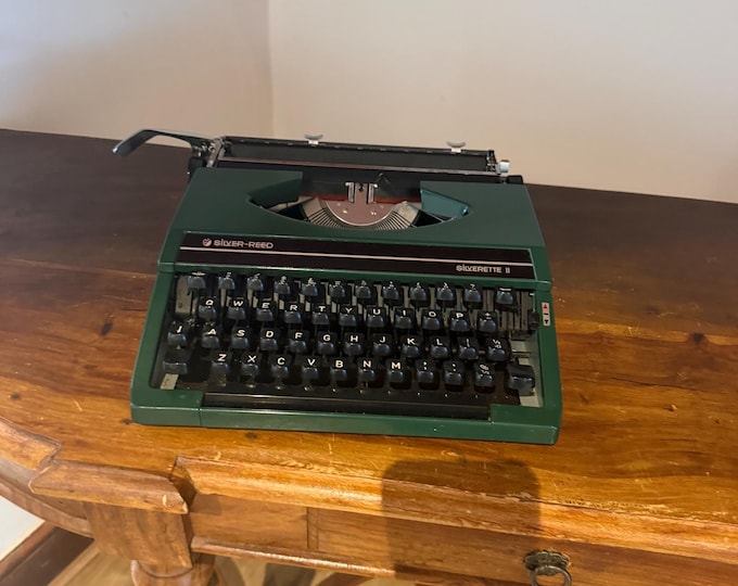 Featured listing image: Dark Green Silver Reed Silverette Typewriter - Case