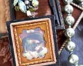 Mother and child daguerreotype case assemblage necklace statement Mary Jesus jewelry Mothers Day antique vintage holy card green Victorian