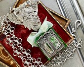 Ornate glass pocket shrine Necklace/belt clip jewelry window mini rosary statuette rhinestone dress vintage religious devotional assemblage