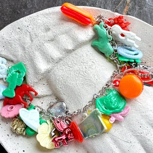 Cracker Jack  Gumball loaded Charm Bracelet fun kids vintage collector jewelry Gum Ball plastic 29 in all Alabama pocket knife burger dog