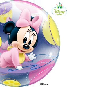 May include: A Disney Baby balloon featuring Minnie Mouse in a pink outfit and bow. The balloon has a clear background with colorful polka dots and stitched lines. The Disney Baby logo is visible.