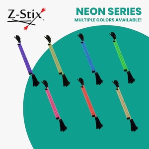May include: A collection of Z-Stix in various neon colors, including purple, green, blue, pink, and orange. Each stick has a black tassel at the bottom. The text "NEON SERIES MULTIPLE COLORS AVAILABLE!" is displayed.
