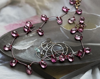 Smooth pink sapphire teardrops and hessonite garnet on silk necklace
