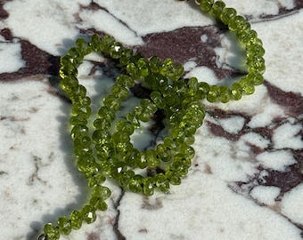 Peridot gemstone knotted necklace August birthstone