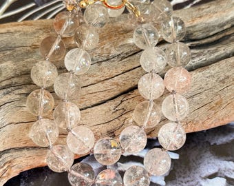 Round smooth natural 12mm quartz knotted necklace strand