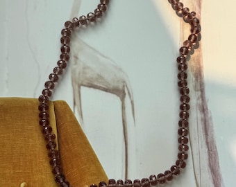 Amazing color changing Zultanite knotted necklace strand with gold filled clasp