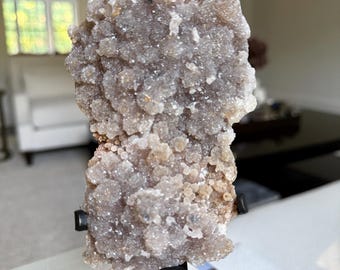 Bubbly Zeolite Specimen on black stand