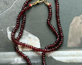 Faceted garnet knotted necklace strand 21 inches