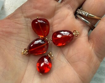 Orange zircon charm pendant