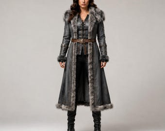 May include: A long, dark gray coat featuring a thick, textured faux fur trim along the collar, front opening, and cuffs. The coat is cinched at the waist with a brown leather belt featuring a metal buckle, worn over a matching dark gray top and pants.