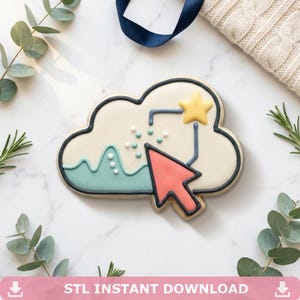 May include: A cloud-shaped cookie decorated with royal icing featuring a black outline, a teal wave pattern, a coral-colored computer cursor, and a yellow star. The design includes small white and teal dots and a black line connecting the elements.