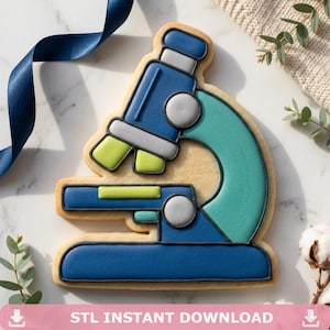 May include: A microscope-shaped biscuit decorated with blue, green, grey, and yellow icing. The text "STL INSTANT DOWNLOAD" is printed at the bottom of the image.