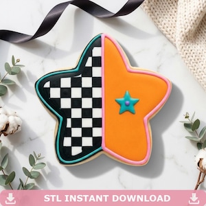 Puede incluir: Una galleta en forma de estrella con un diseño dividido. Una mitad presenta un patrón de cuadros blancos y negros, la otra es naranja con una estrella turquesa. La galleta está delineada en rosa y turquesa, con el texto "STL INSTANT DOWNLOAD" en la parte inferior.