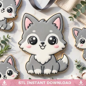 Puede incluir: Una colección de galletas de azúcar decoradas con forma de lobo de dibujos animados. Las galletas presentan glaseado gris, blanco y negro con detalles en rosa. El texto "STL INSTANT DOWNLOAD" se muestra en la parte inferior de la imagen.