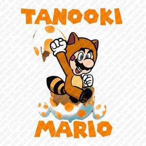 May include: A digital illustration of Mario in a Tanooki suit emerging from a cracked egg. The image features the word "TANOOKI" above and "MARIO" below in orange block letters. The egg is white with orange polka dots.