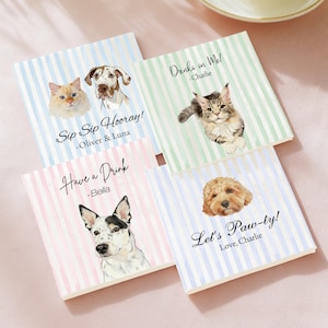 May include: A set of three ceramic mugs with a speckled, cream-colored glaze. Each mug features a different hand-painted floral design in shades of blue, green, and yellow. The mugs have a simple, modern shape.