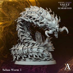 May include: A grey miniature figure of a segmented, multi-legged creature with a skeletal head and sharp appendages. The base features a small obelisk with a scarab symbol. Text on the image reads Empire of Sands Vault of the Scarab God.