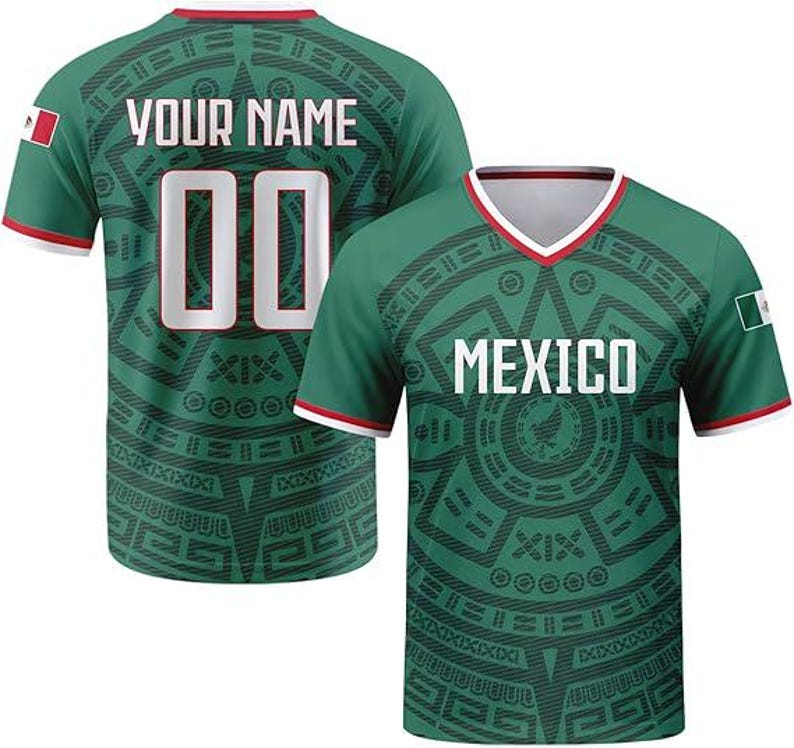 May include: A green short-sleeved V-neck jersey featuring a dark green Aztec-inspired pattern. The front displays the text MEXICO in white, while the back shows the text YOUR NAME and the number 00. Both sleeves feature a small Mexican flag patch.