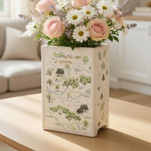 May include: A set of three ceramic mugs with a speckled, matte finish. The mugs are in shades of cream, light gray, and dark gray. Each mug has a simple, minimalist design, perfect for coffee or tea.