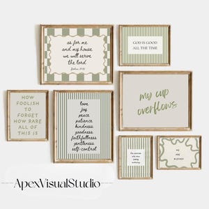 May include: A gallery wall set of seven framed prints featuring sage green and cream color palettes. The prints display various inspirational quotes and phrases in black or green text, including "as for me and my house we will serve the lord" and "my cup overflows" with striped and wavy border patterns.