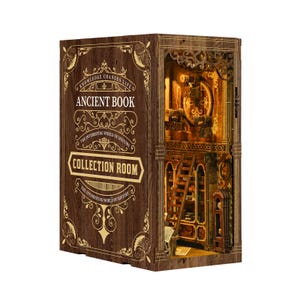 May include: A wooden book nook with the text "ANCIENT BOOK COLLECTION ROOM" and intricate interior details. The design features a ladder, shelves, and a clock, all illuminated with warm lighting, creating a miniature world.