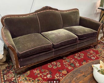 Authentic 3 seeter sofa from the 1920’s made out of solid mohagony with ORIGINAL  green upholstery.Comes with its side chair.