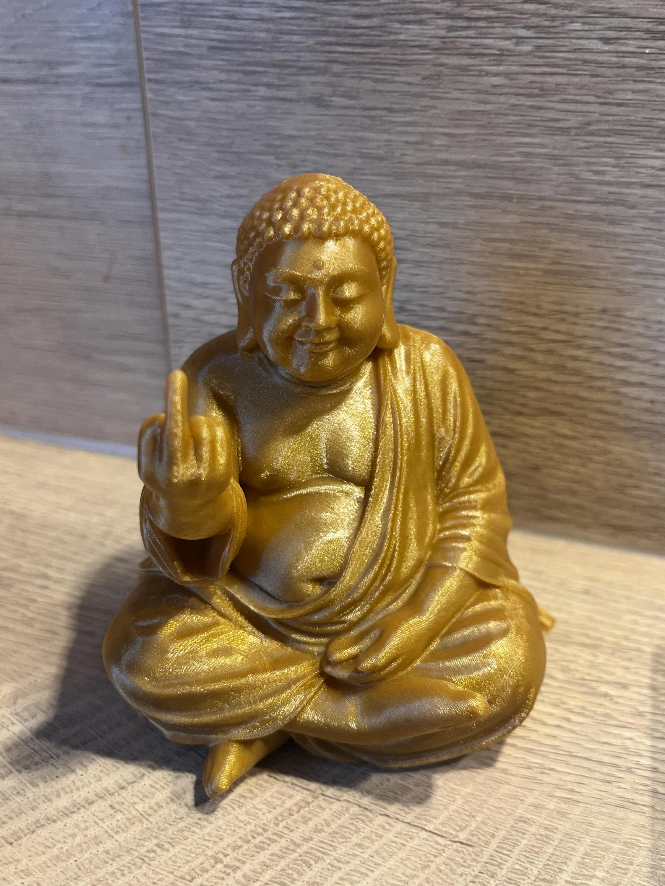 Humorous Buddha Giving the Middle Finger – Unusual Buddha Statue