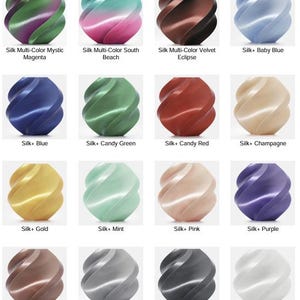Pode incluir: Uma grade de objetos coloridos impressos em 3D com apar&ecirc;ncia de seda. As cores incluem magenta, azul, verde, vermelho, dourado, rosa, roxo, ouro rosa, prata e branco. Cada objeto tem um design exclusivo em espiral.