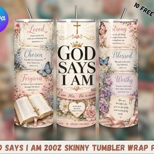 May include: A 20oz skinny tumbler wrap featuring religious text and floral motifs. The design includes the words GOD SAYS I AM, a cross, a crown, butterflies, and an open Bible. The color palette consists of soft pinks, purples, and creams.